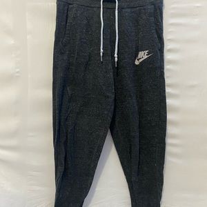 Nike dark gray joggers in a size small